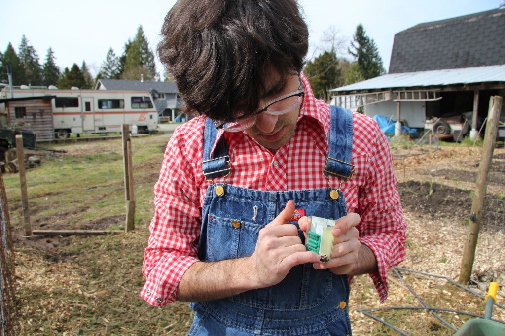 Chris K. watches our little soil tester do it's work.