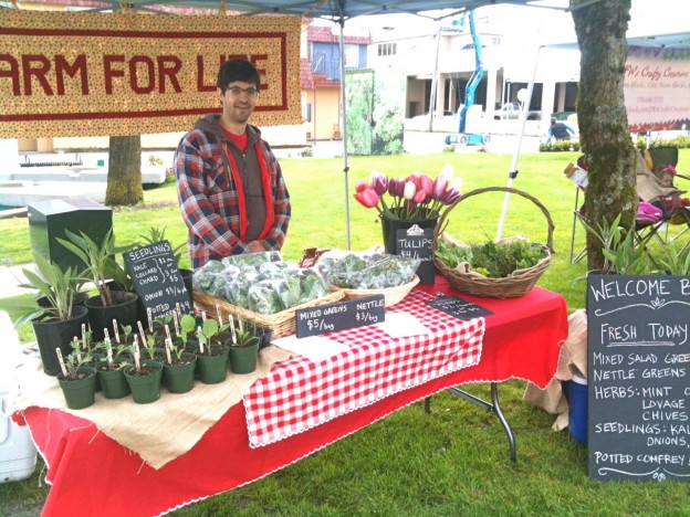 Chris making one of his goofy faces at the special Earth Day Farmers Market from two weeks ago.
