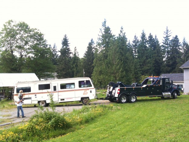 Saying goodbye to the motorhome this morning as it gets towed off the property this morning. Kai was pretty enthralled with the fancy tow truck.